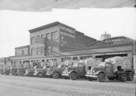 Deeks-McBride Ltd., Main St. : mining trucks and bldg.