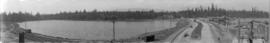 [View of Stanley Park causeway showing Lost Lagoon and the Vancouver Rowing Club building on Coal...