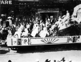 [An unidentified float in the 600 Block of Granville Street during a Victoria Day parade]