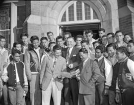 [Kaimuki High School football team from Hawaii gathered in front of the chemistry building at UBC]