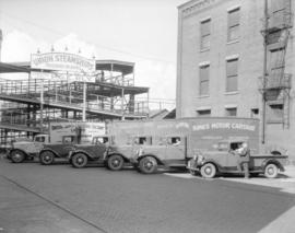 King's [Motor Cartage] trucks [in front of the Union Steamship passenger entrance]