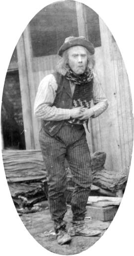 [Alfred T. Layne, actor, in role of old village idiot with shawl, different pose]