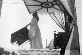[A woman on a float in the Labour Day parade]