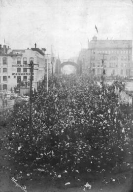 [View of Granville Street from the C.P.R. Station of crowds welcoming soldiers returning from the...