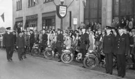 [India's Prime Minister Nehru walking by Vancouver Police Motorcycle escort]