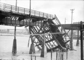 [Portion of fire damaged section of Connaught Bridge (Cambie Street Bridge), collapsed into False...