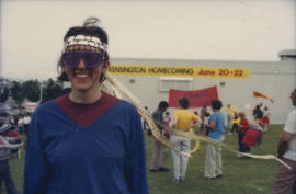 Woman wearing headband and sunglasses at Park Party Tour