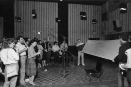 Group in recording studio at Griffiths Gibson Productions
