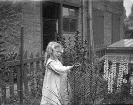 [Jean Davidson in garden]