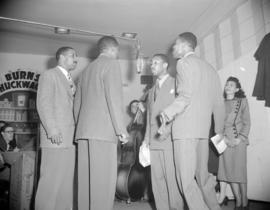 [Entertainers at a microphone during a CJOR broadcast of Burns' "Chuckwagon" radio show]