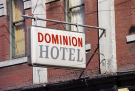 [210-216 Abbott Street - Dominion Hotel business sign, 1 of 2]