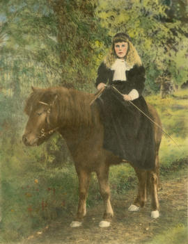 Aldyen Irene Hendry riding a pony