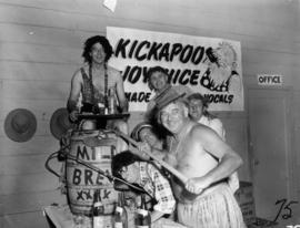 Men dressed as characters from Li'l Abner comic strip with "Kickapoo Joy Juice"