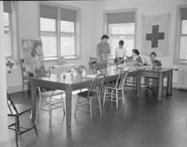 [Children engaged in activities at the Junior Red Cross]