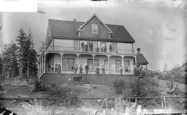 [People standing on porch of Malaspina Hotel, Lund, B.C.]