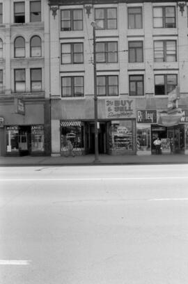 [54-62 East Hastings Street - Haney Tailors, St. James Barber Co., The Option Shop and Ripley's]