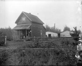 [House and two sheds]