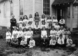 Edna Olsen holding banner, Sunday school