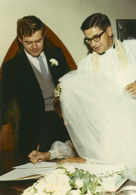 Margaret signing the wedding registry with Sydney and Rev. Robert Blackwell