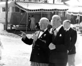 P.N.E. President J.S.C. Moffitt, W.J. Borrie, and unidentified guest