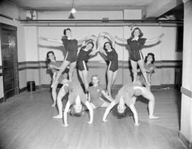 [Group portrait of some posed acrobats]