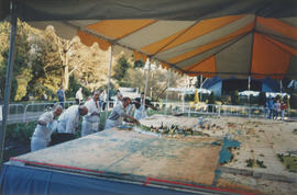 Serving the Vancouver Centennial birthday cake