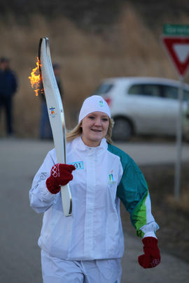 Day 90 Coca Cola's torchbearer 91 Marleigh Kallhood carries the flame in Pritchard, British Columbia