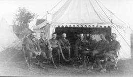 [Officers of the 6th Regiment D.C.O.R. camp at the Esquimalt and Nanaimo Railway station during t...