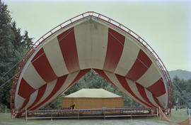 Stage under red and white striped canopy at Stanley Park