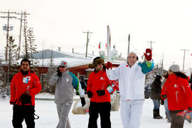 Day 10 Coke Global CEO Muhtar Kent runs as Torchbearer 3 through Churchill, MB.