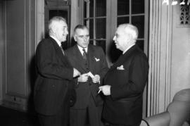 [Group portrait of Alderman George C. Millar, Mr. N.B. Walton, vice president of the CNR, and Chi...