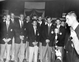 [Canadian Olympic Team members are welcomed at a reception at the airport]