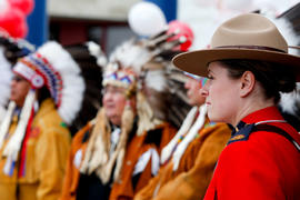 Day 78 RCMP stands with Chiefs ar Hobbema's flame blessing in Alberta.
