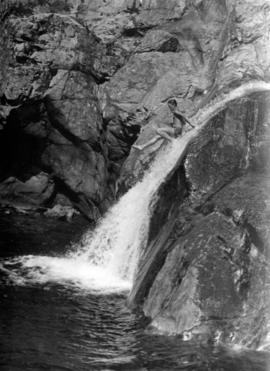 [Boy sliding down] Lynn Creek Falls