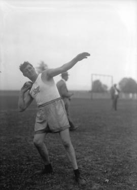 Athletes - weight men in action [from the Vancouver Police Mutual Benevolent Association]