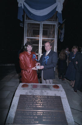 Carole Taylor and Malcolm Ashford holding trigger at the first firing of the Nine O'Clock Gun