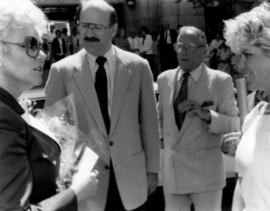 Mike Harcourt , Hugh Pickett and two unidentified women