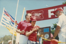 Award presentation at finish line