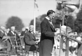 [David Oppenheimer, grand nephew of Mayor David Oppenheimer, reading the original illuminated add...