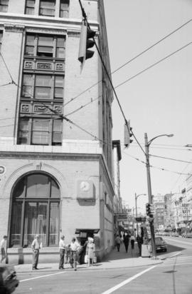 [Southwest corner of the intersection of Carrall Street and West Hastings Street]