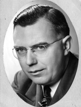 Head and shoulders portrait of Alderman Archie J. Proctor