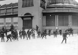 Military 68th C.F.A. [snowball fight outside Exhibition Building]