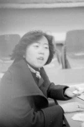 Young woman in an office or waiting area