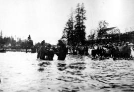 [Woman being baptized by the Reverends Christmas and Fair in English Bay]