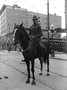 [Mounted police constable at Davie and Granville Streets]