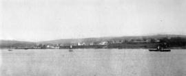 [View from water of unidentified settlement]