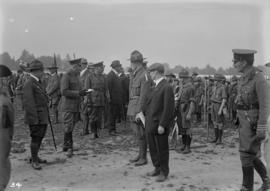 Military officers inspecting scouts