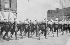 Yukon contingent - Canadian soldiers [marching east past Seymour Street on Hastings Street]