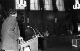 Michael Francis speaking from podium in council chambers