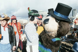 Tillicum interacting with attendee at Polar Bear Swim